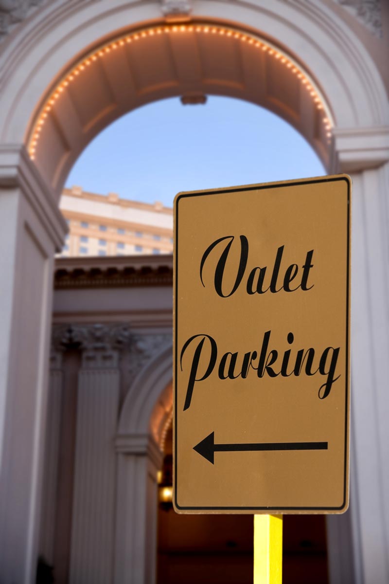 Valet attendant greeting a driver